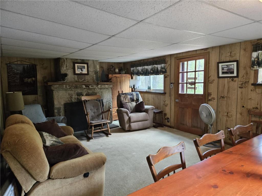 23 Rock Hill Road Weedville, PA 15868 - Photo 2 of 35 a living room with furniture and a fireplace