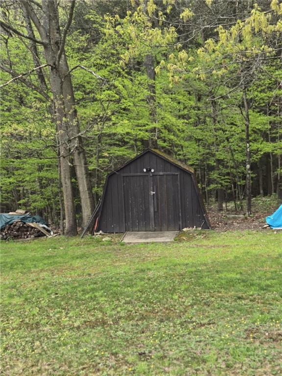 23 Rock Hill Road Weedville, PA 15868 - Photo 21 of 35 a house with a yard