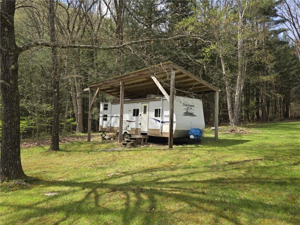 23 Rock Hill Road Weedville, PA 15868 - Photo 25 of 35 a view of a house with a yard