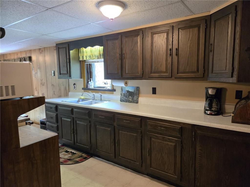 23 Rock Hill Road Weedville, PA 15868 - Photo 8 of 35 a kitchen with a sink cabinets and a window