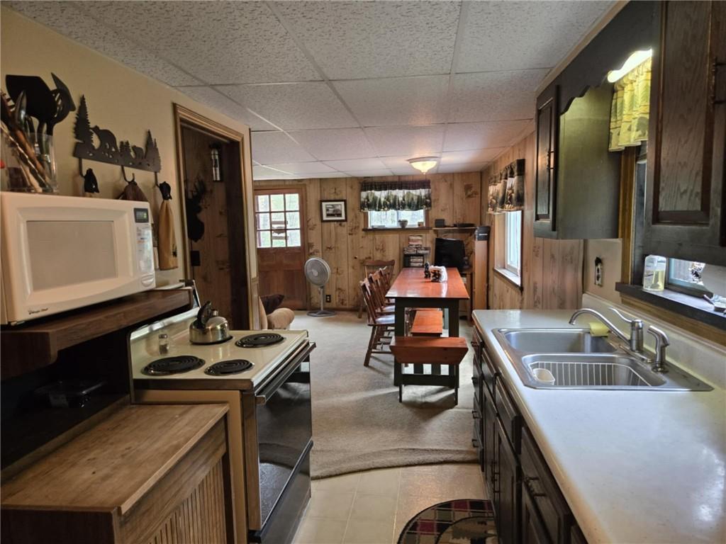 23 Rock Hill Road Weedville, PA 15868 - Photo 10 of 35 a kitchen filled with a stove a sink and a refrigerator