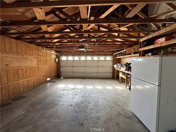 a view of empty room with racks