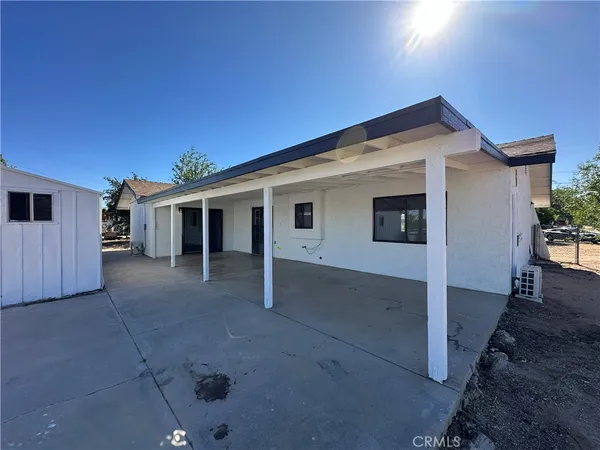 a front view of a house with a garage