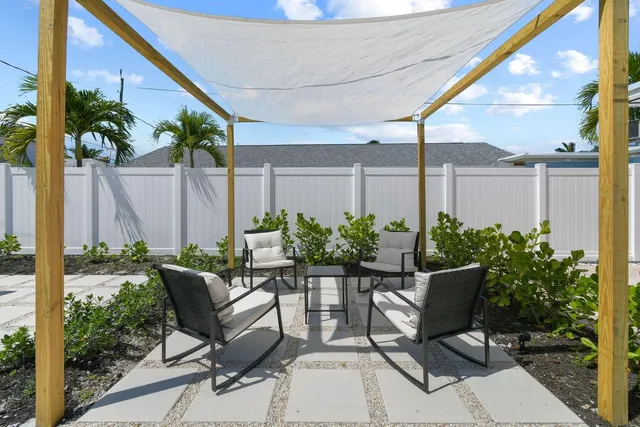 a view of an outdoor sitting area with couch