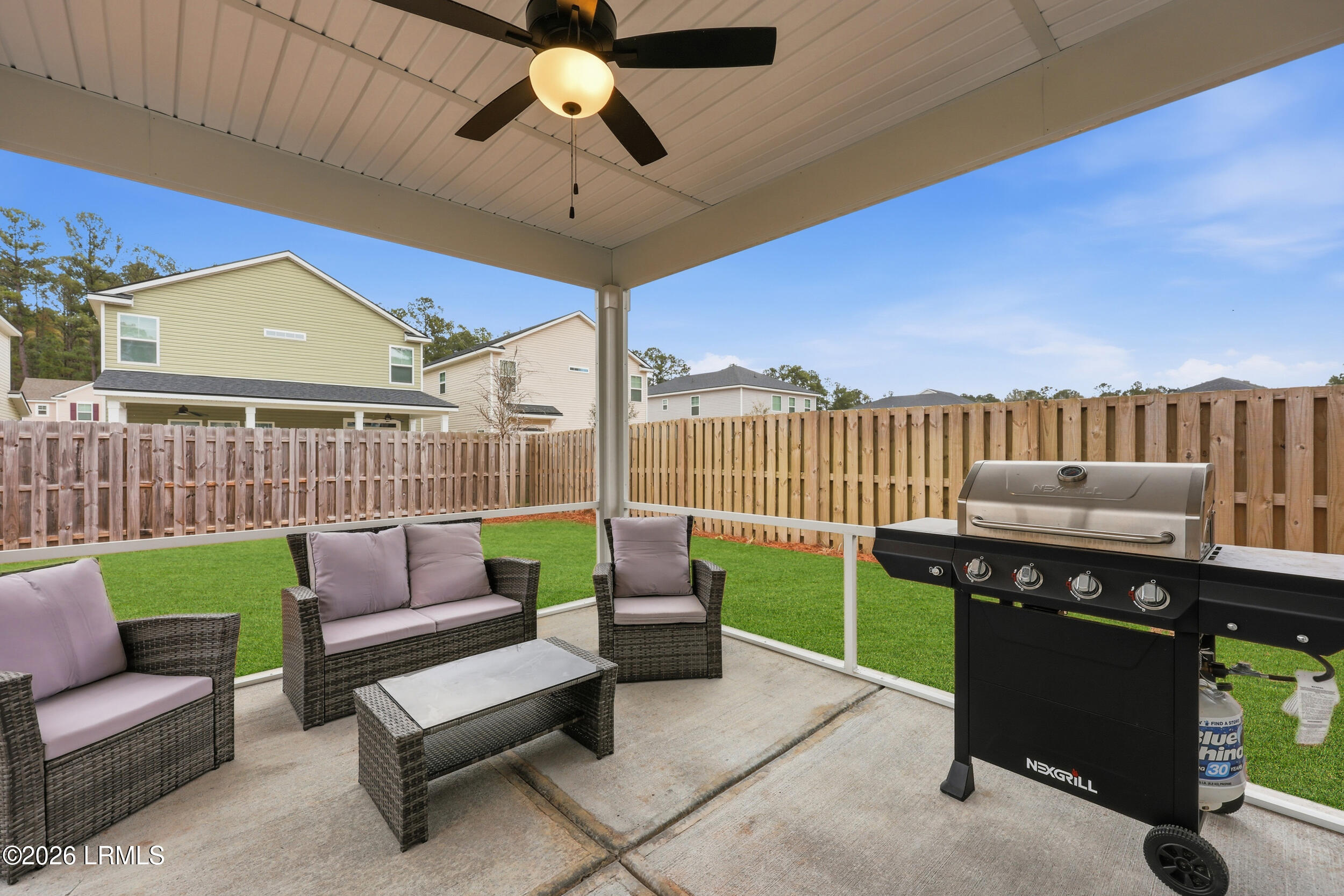 160 Conifer Street Hardeeville, SC 29927 - Photo 18 of 21 screend rear patio