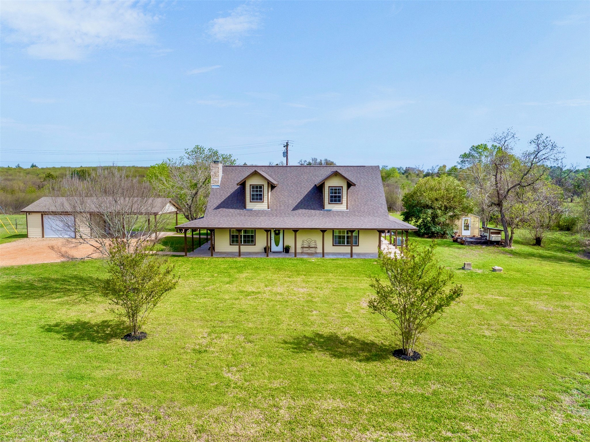 a view of a house with a big yard