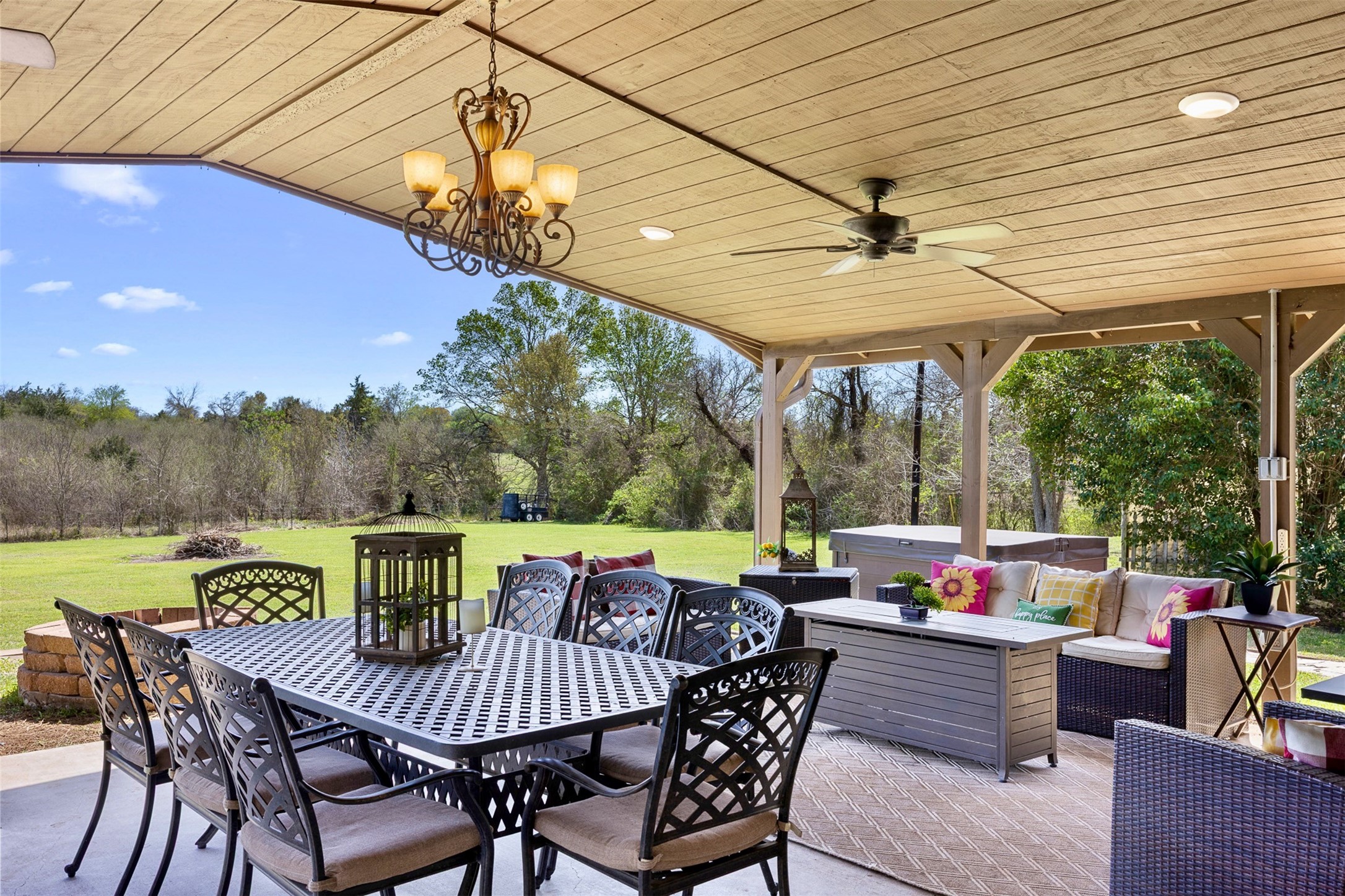 999 Salem Road Brenham, TX 77833 - Photo 12 of 41 a view of a patio with a table chairs and a patio