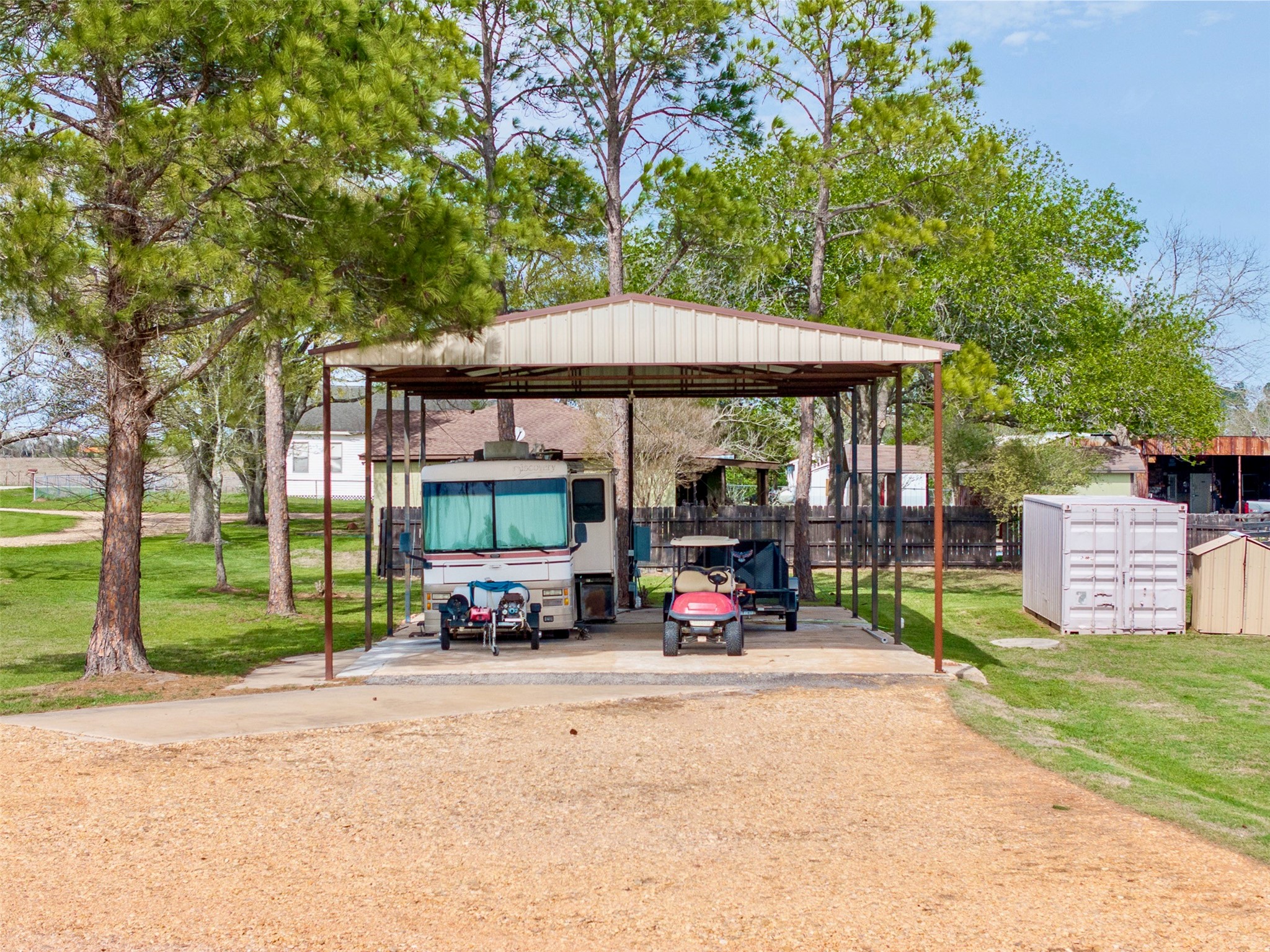 999 Salem Road Brenham, TX 77833 - Photo 16 of 41 a view of a park with furniture and a small yard