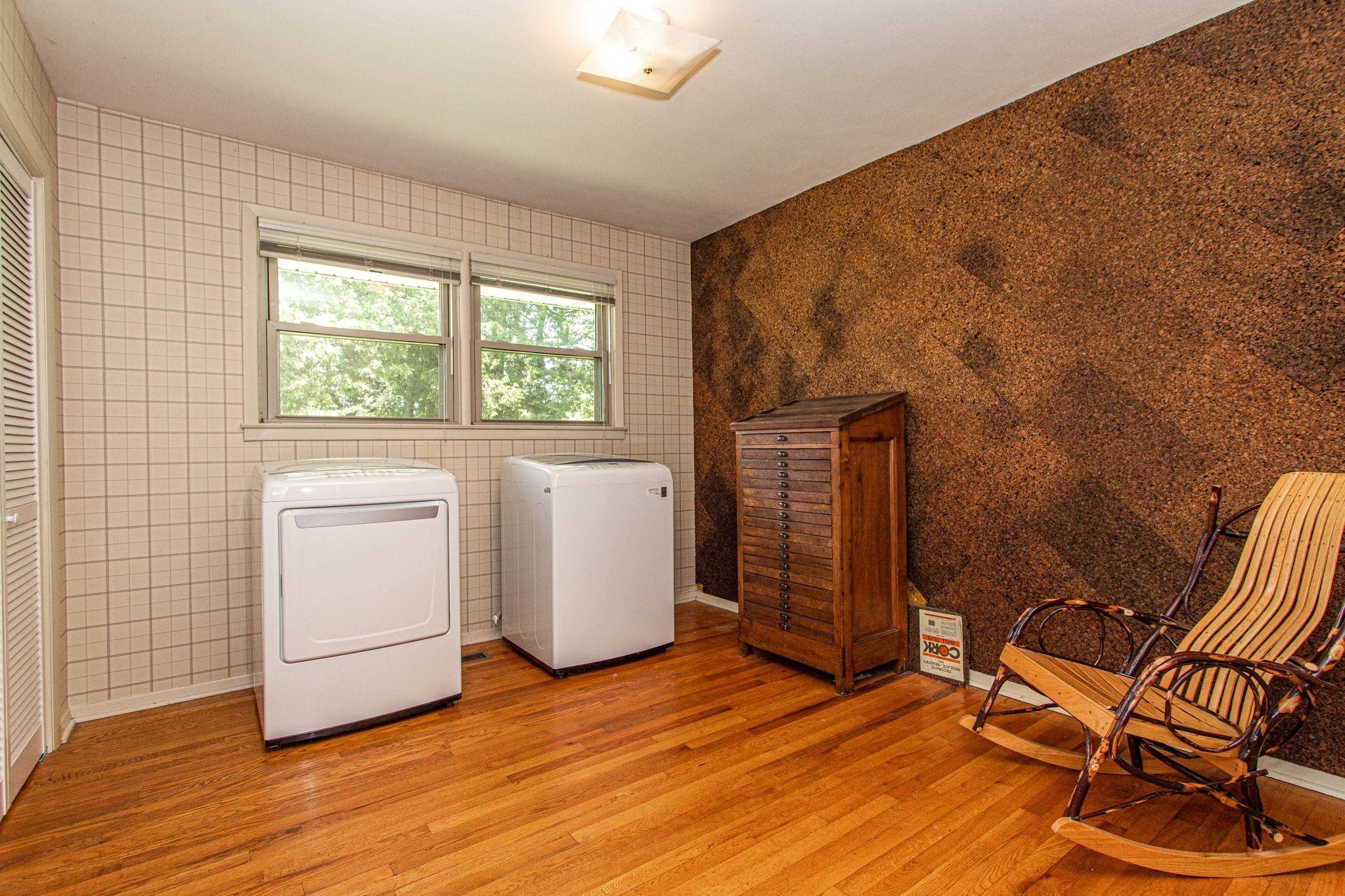 5509 Inwood Road Northwest Knoxville, TN 37921 - Photo 23 of 40 a view of a livingroom with furniture and a window