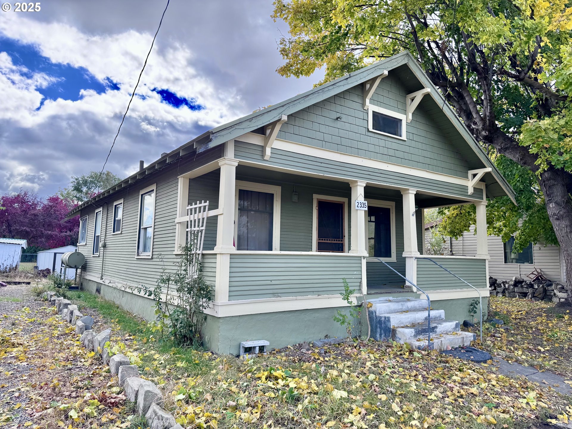 2335 Grace Street Baker City, OR 97814 - Photo 15 of 19 a front view of a house with garden