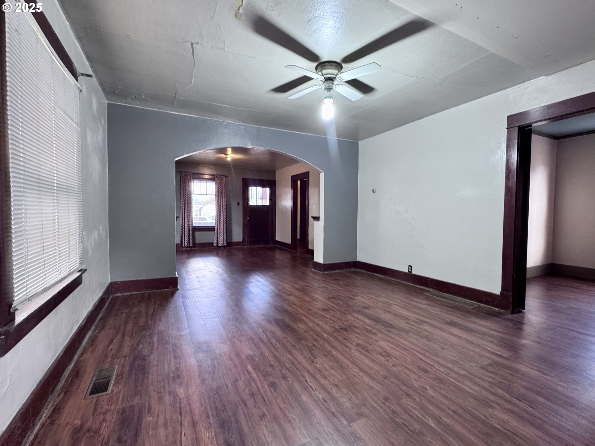 2335 Grace Street Baker City, OR 97814 - Photo 4 of 19 a view of livingroom with hardwood floor and ceiling fan