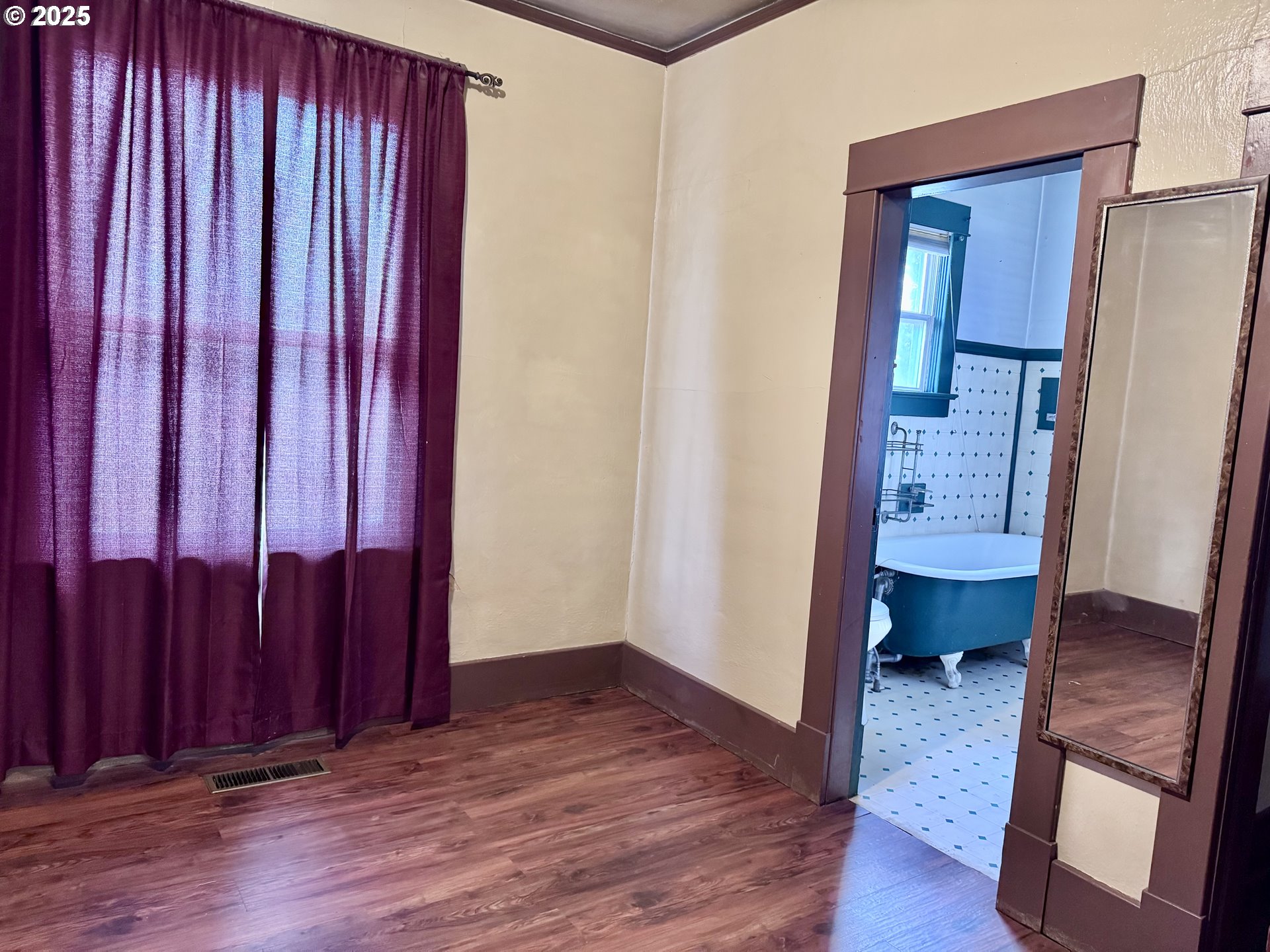 2335 Grace Street Baker City, OR 97814 - Photo 9 of 19 a view of a room with wooden floor and chair
