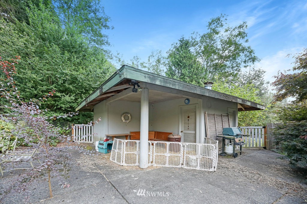 15307 Baker Heights Road Mount Vernon, WA 98273 - Photo 27 of 37 a house with trees in the background