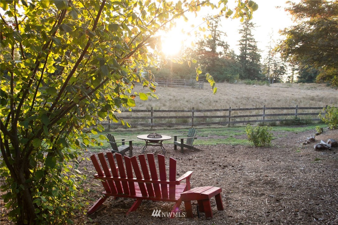 15307 Baker Heights Road Mount Vernon, WA 98273 - Photo 35 of 37 a view of a bench in a backyard