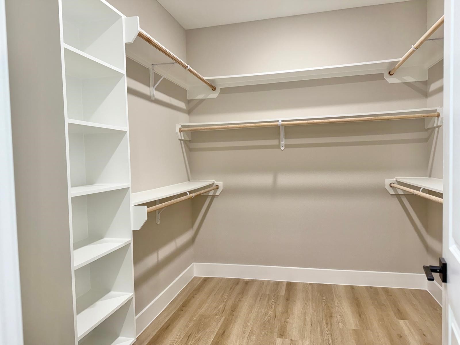2606 Liguria Ln Spring Spring, TX 77388 - Photo 11 of 29 a view of walk in closet with empty racks