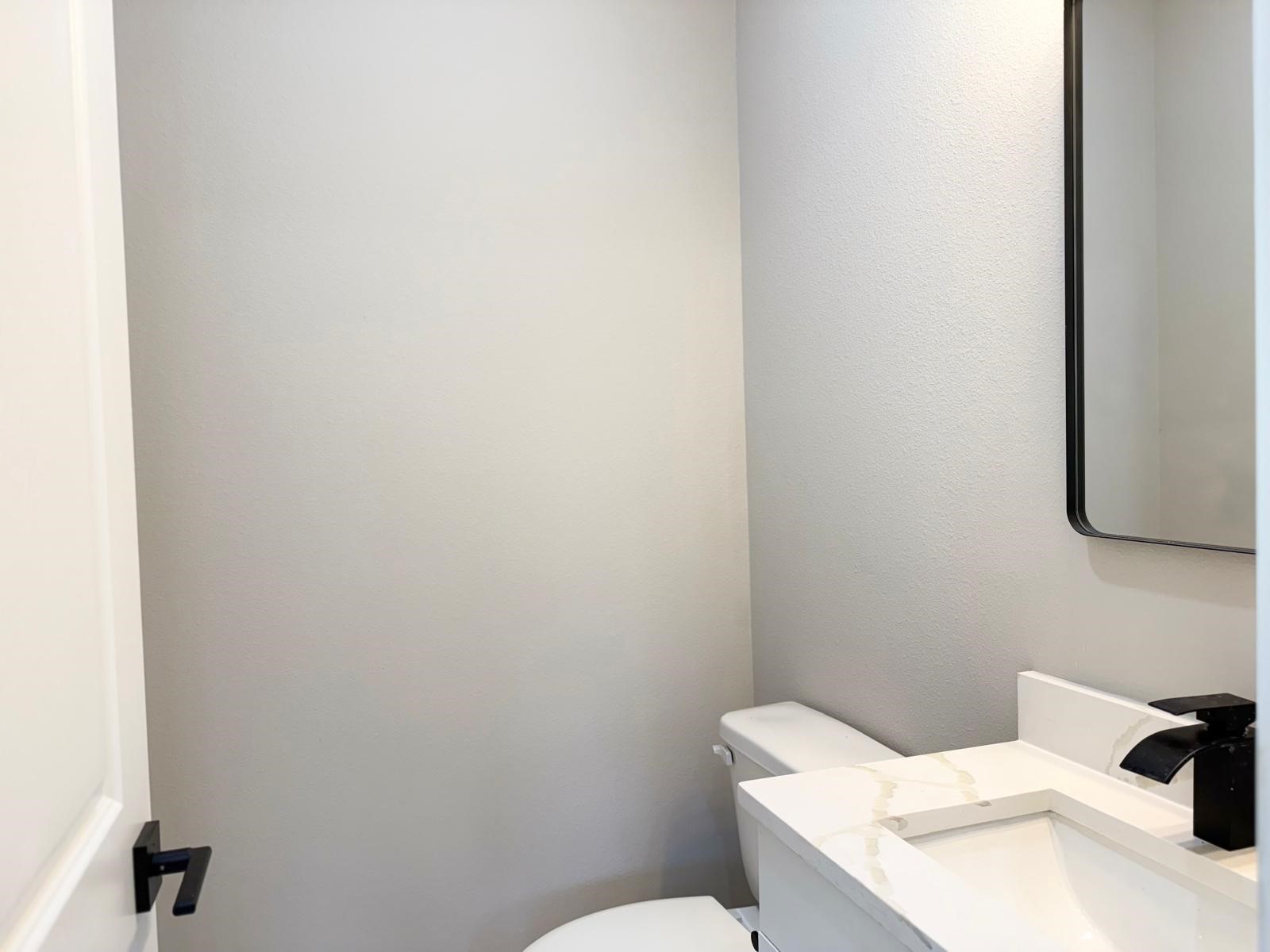 2606 Liguria Ln Spring Spring, TX 77388 - Photo 9 of 29 a bathroom with a toilet and sink