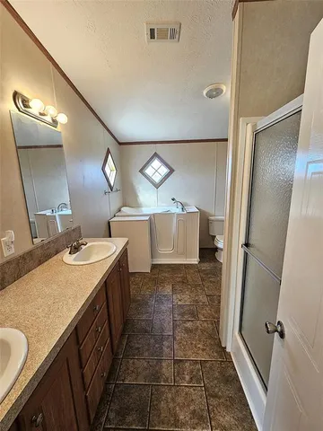 a bathroom with a sink and mirror