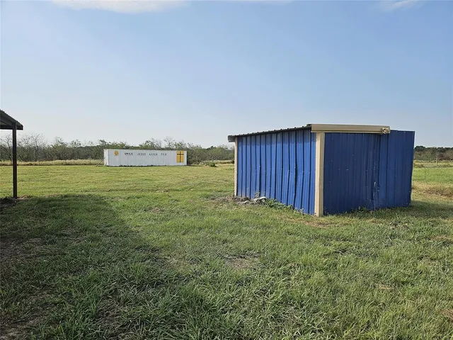 a view of outdoor space and yard