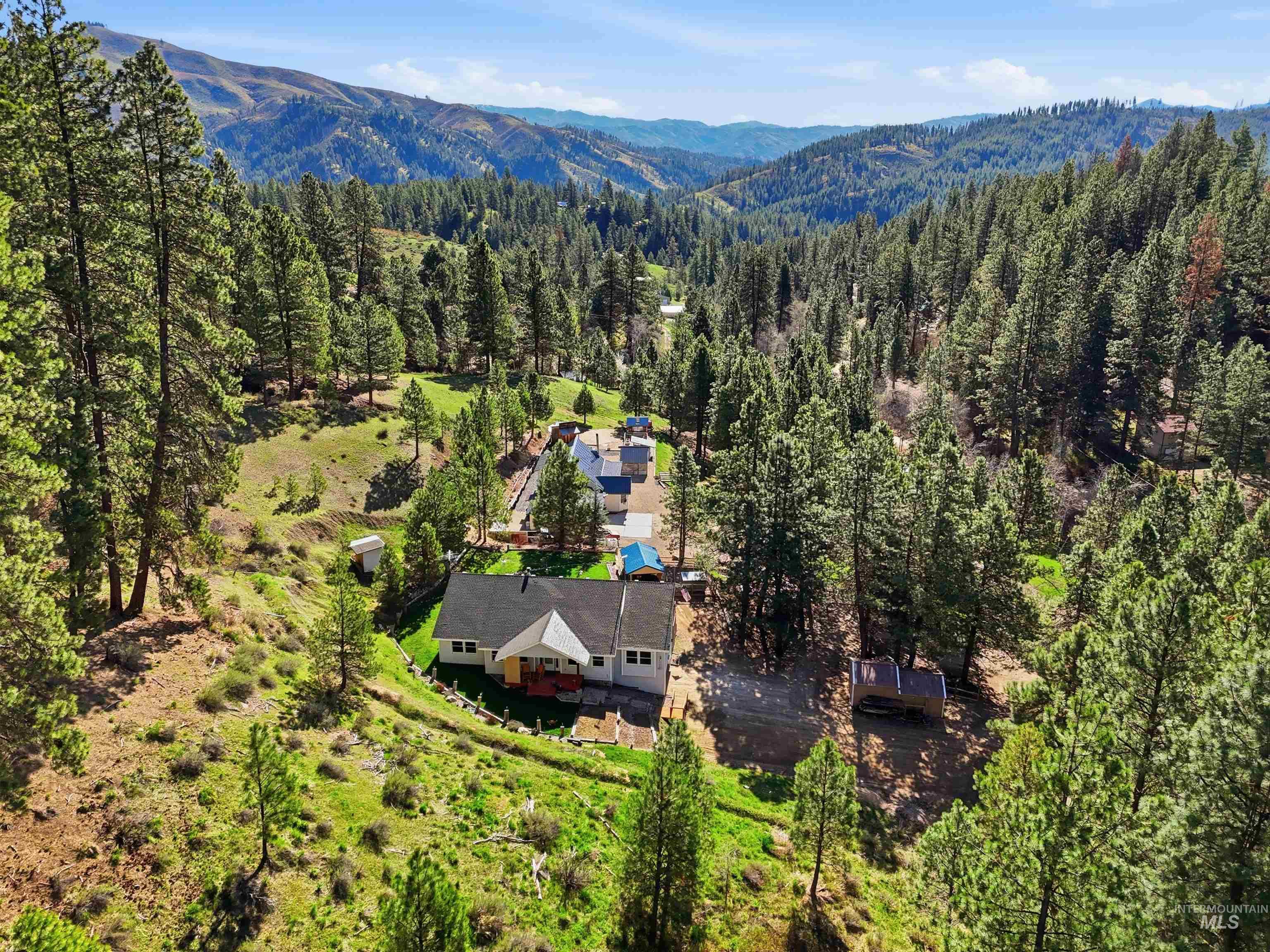 95 Johnson Creek Road Boise, ID 83716 - Photo 49 of 49 Bird's eye view of a mountain backdrop and a forest