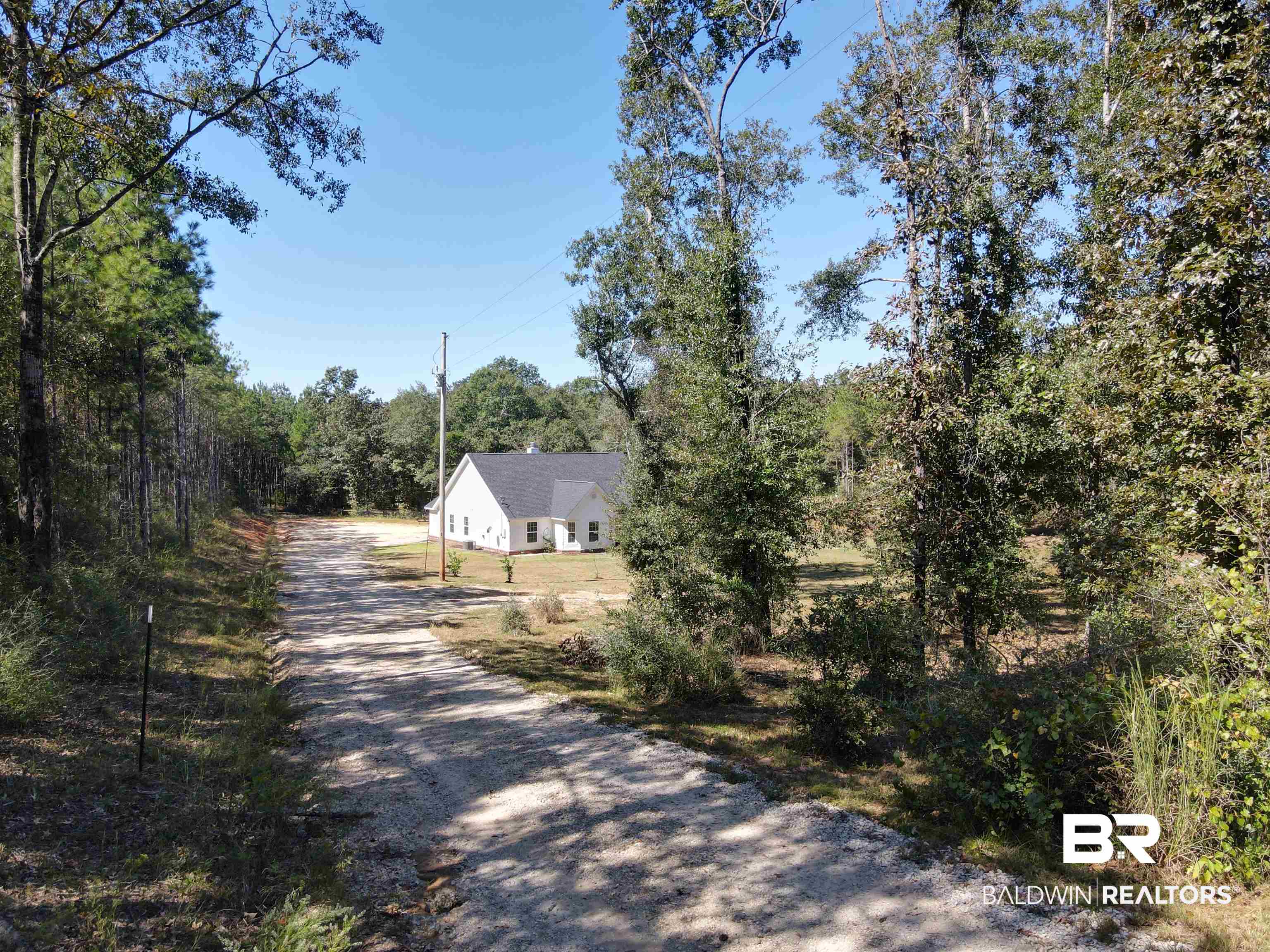 30687 Brady Road Robertsdale, AL 36567 - Photo 45 of 53 The entrance of the driveway.