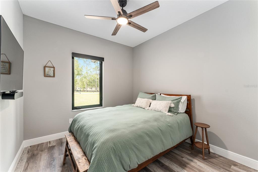 9 Middleground Road Ocala, FL 34482 - Photo 28 of 42 a bedroom with a bed and window