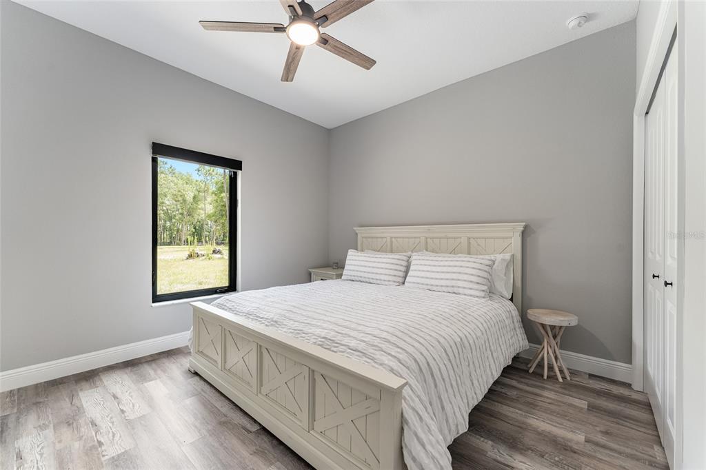 9 Middleground Road Ocala, FL 34482 - Photo 31 of 42 a bedroom with a bed and window