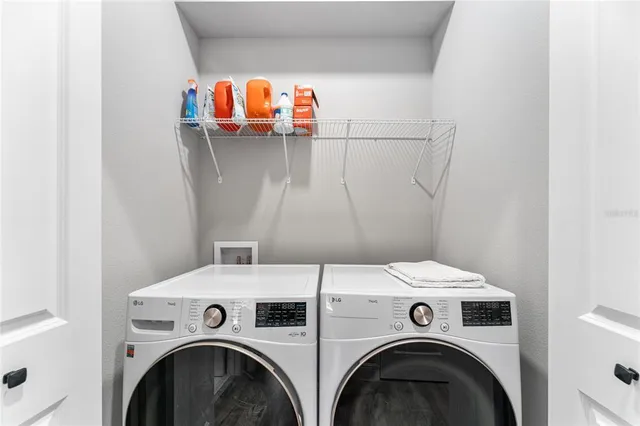 a utility room with dryer and washer