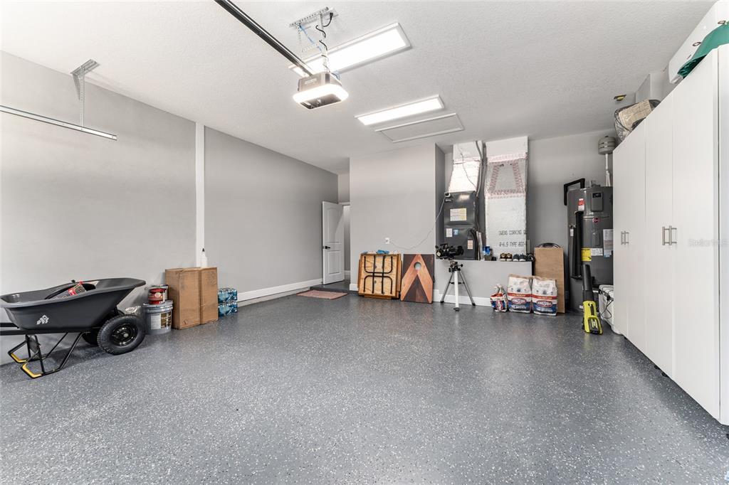 9 Middleground Road Ocala, FL 34482 - Photo 34 of 42 a living room with furniture and a chandelier