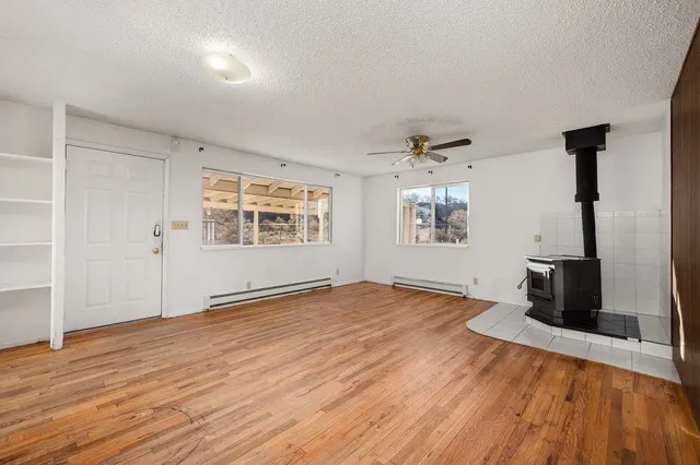 a kitchen with kitchen island a counter top space a sink and appliances