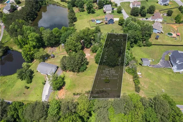 an aerial view of residential house with outdoor space