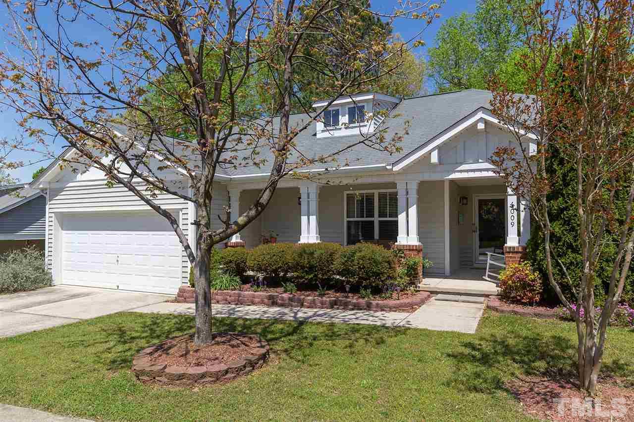 4009 Hopper Street Raleigh, NC 27616 - Photo 1 of 25 Lovely ranch home with two-car garage and great front porch.