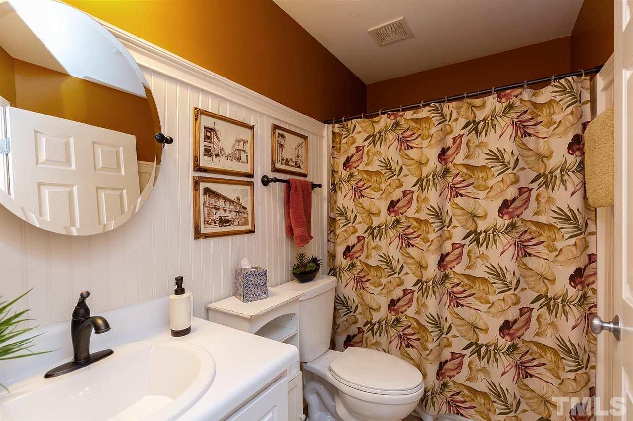4009 Hopper Street Raleigh, NC 27616 - Photo 18 of 25 Great bath for guests or the kids. Beadboard trim and updated vanity.