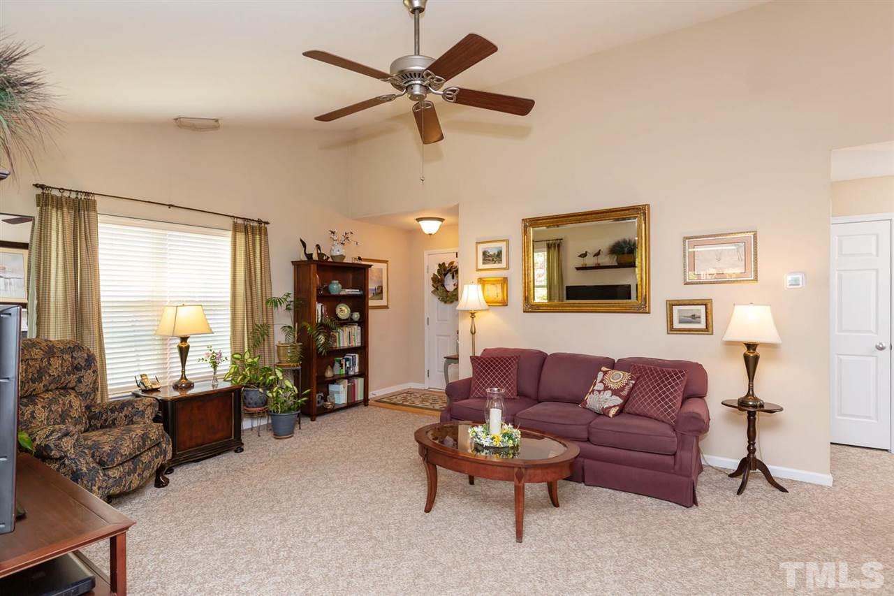 4009 Hopper Street Raleigh, NC 27616 - Photo 6 of 25 Another view of the light, bright living area.