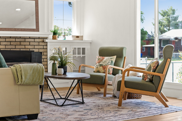 189 West Center Street Midvale, UT 84047 - Photo 11 of 64 Bright living area featuring wood-finish flooring and a decorative rug