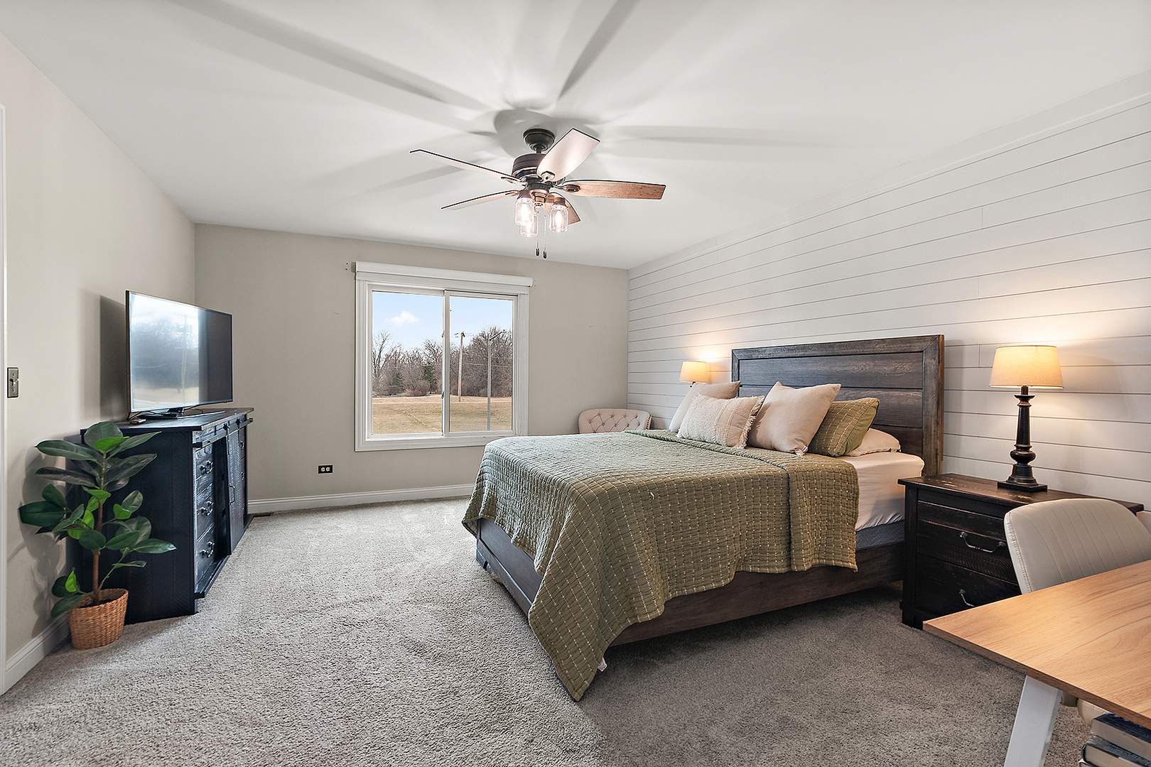 8237 Pecan Place Frankfort, IL 60423 - Photo 16 of 39 a bedroom with a bed and a flat screen tv