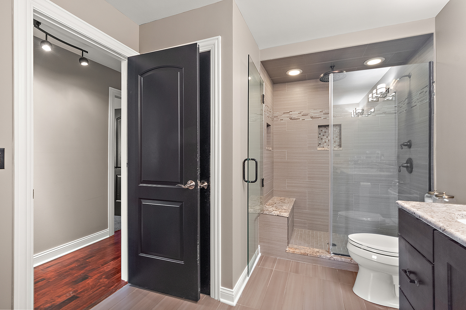 8237 Pecan Place Frankfort, IL 60423 - Photo 19 of 39 a bathroom with a toilet a sink and shower