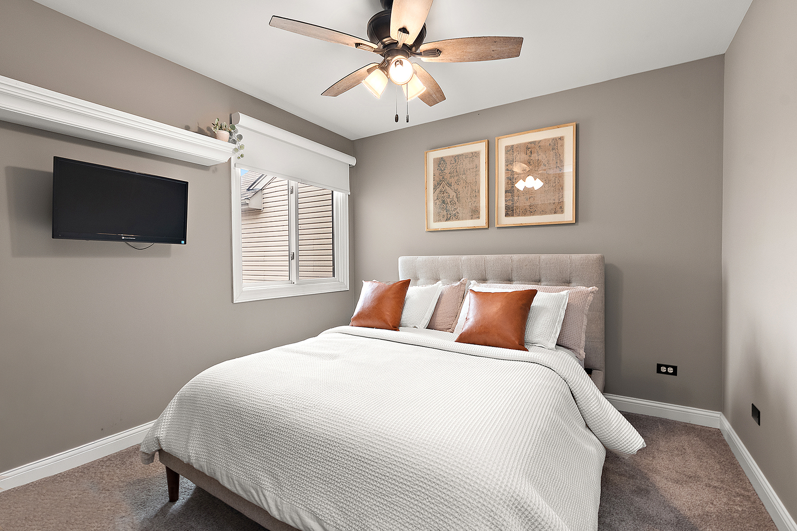 8237 Pecan Place Frankfort, IL 60423 - Photo 22 of 39 a bedroom with a large bed and a flat screen tv