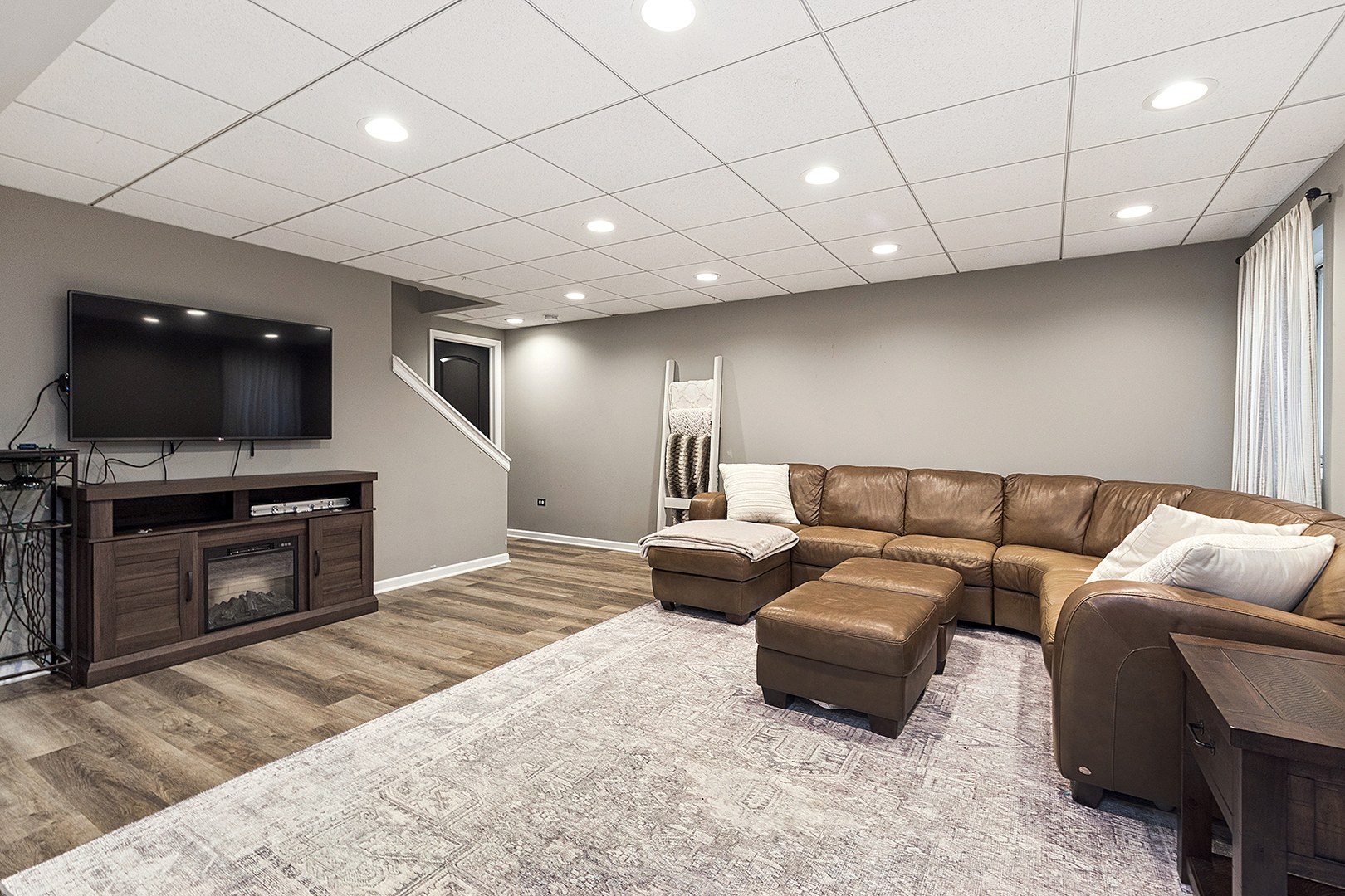 8237 Pecan Place Frankfort, IL 60423 - Photo 25 of 39 a living room with furniture and a flat screen tv