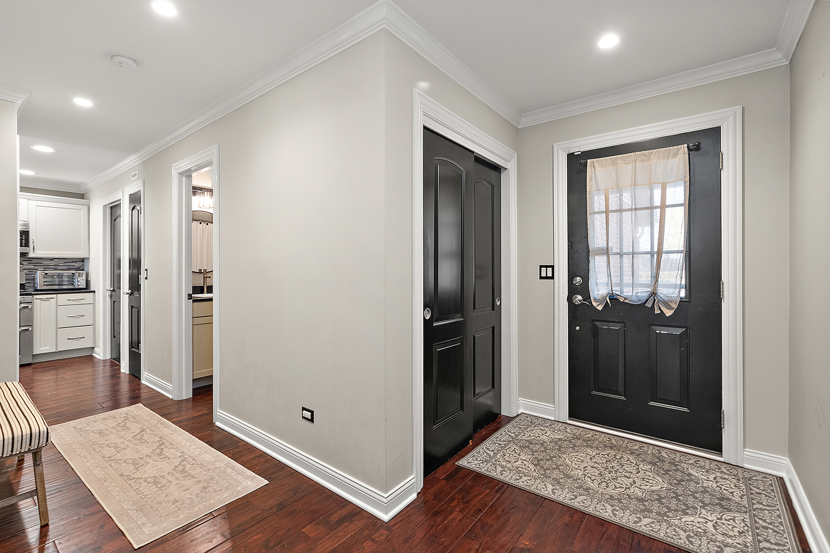 8237 Pecan Place Frankfort, IL 60423 - Photo 3 of 39 a view of hallway with wooden floor