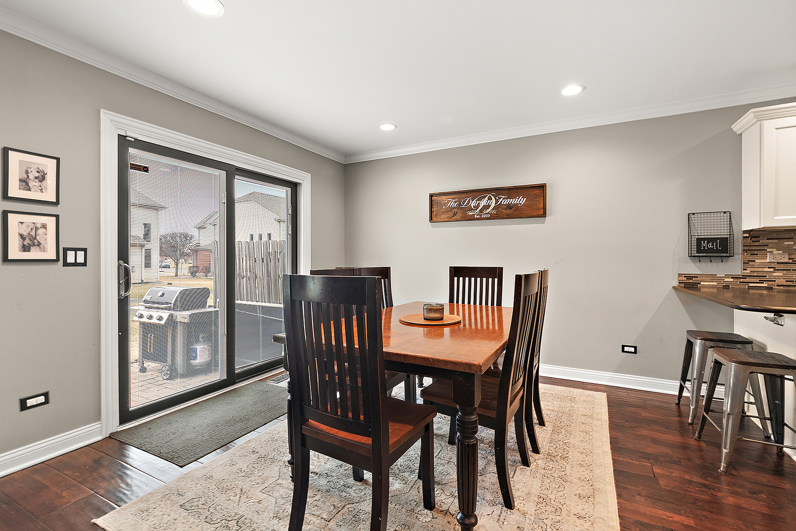 8237 Pecan Place Frankfort, IL 60423 - Photo 10 of 39 a view of a dining room with furniture window and wooden floor
