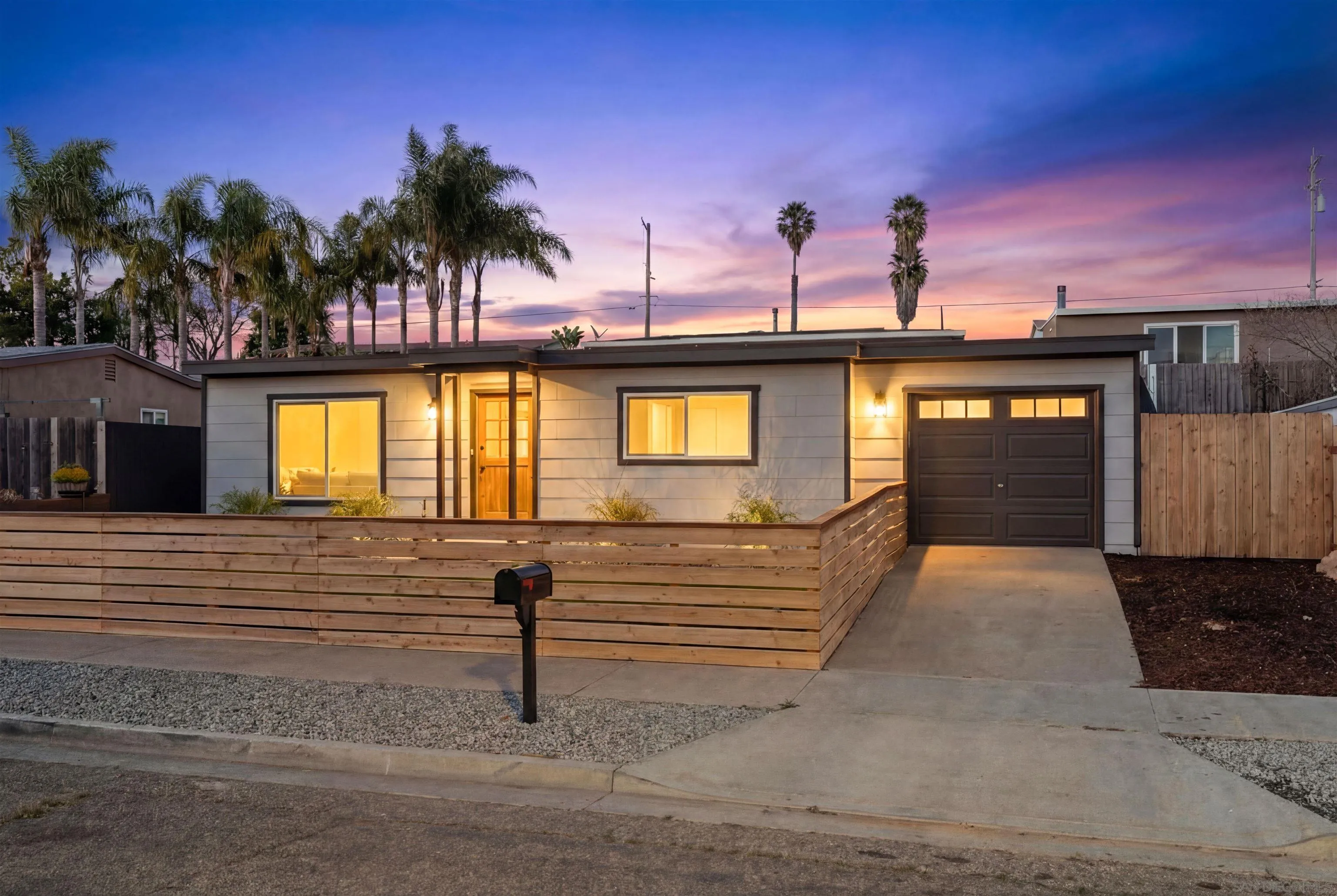 1426 Santa Rosa Street Oceanside, CA 92058 - Photo 1 of 73 a front view of a house with a yard