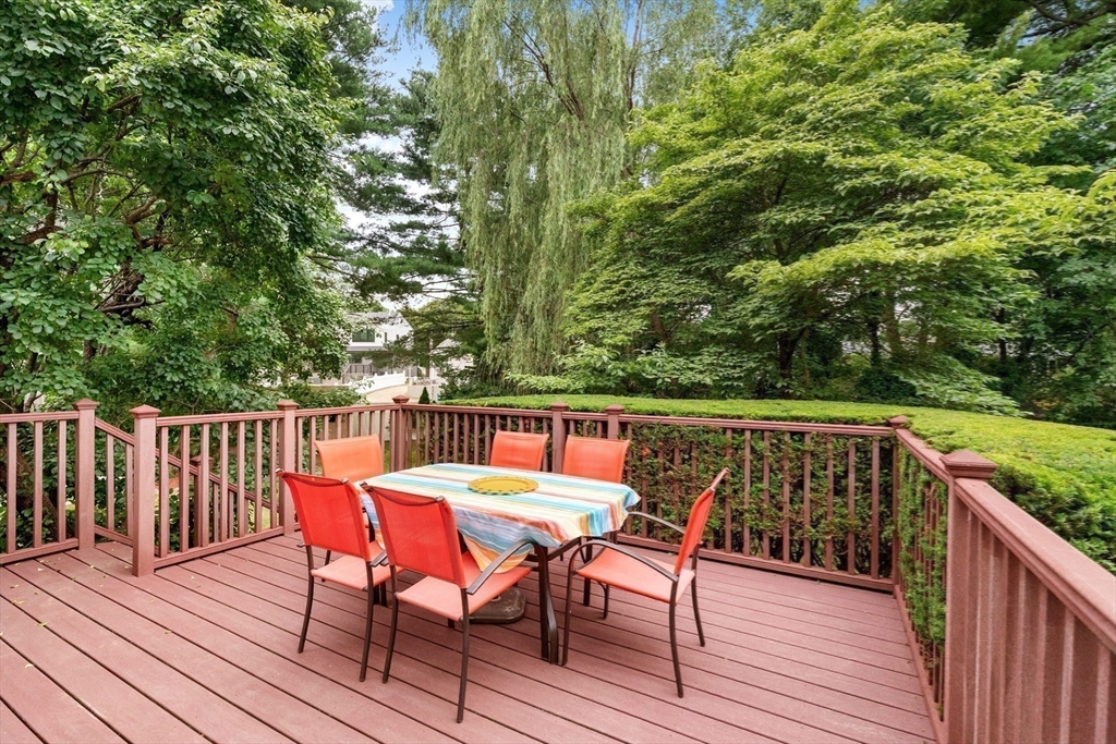 44 Westlund Road Belmont, MA 02478 - Photo 13 of 30 a view of balcony with furniture and wooden floor