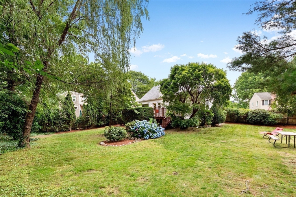 44 Westlund Road Belmont, MA 02478 - Photo 15 of 30 a front view of a house with a yard