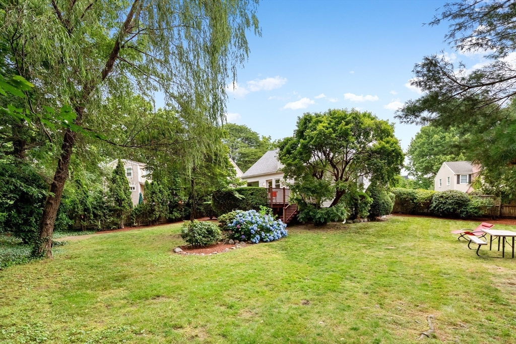 44 Westlund Road Belmont, MA 02478 - Photo 18 of 30 a front view of a house with a yard