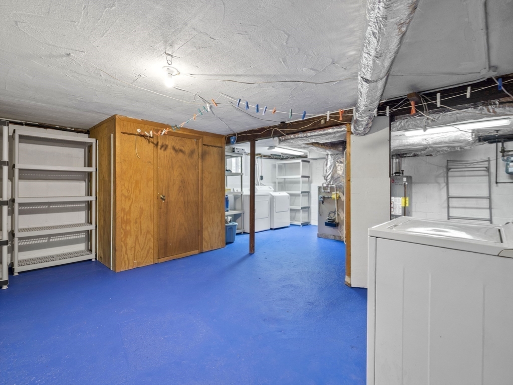 44 Westlund Road Belmont, MA 02478 - Photo 19 of 30 a view of empty room with wooden floor and cabinet