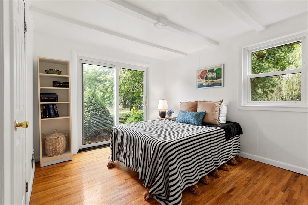 44 Westlund Road Belmont, MA 02478 - Photo 9 of 30 a bedroom with a bed and a large window