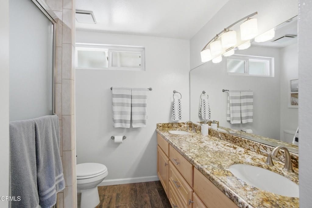 1288 Old Ranch Road Camarillo, CA 93012 - Photo 26 of 61 a bathroom with a granite countertop sink toilet and shower