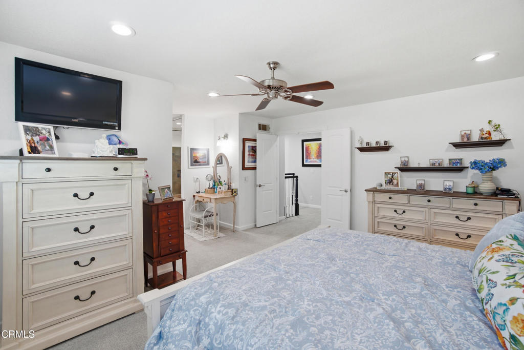 1288 Old Ranch Road Camarillo, CA 93012 - Photo 31 of 61 a view of a bedroom with cabinet flat screen tv and windows