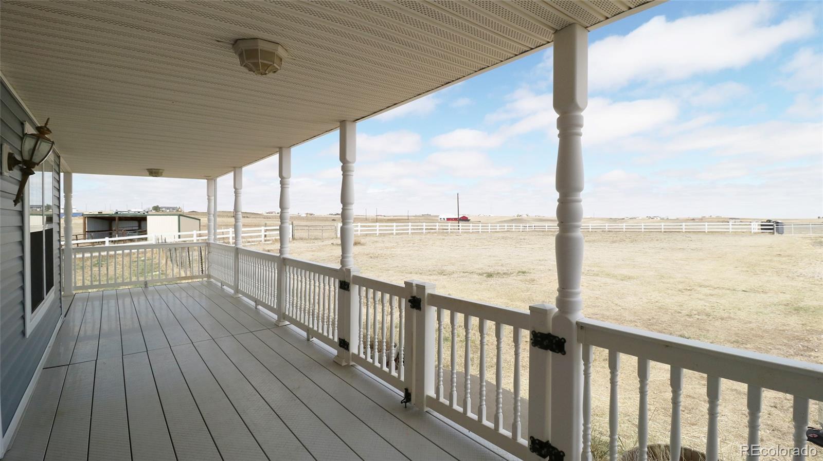44166 East Iliff Trail Bennett, CO 80102 - Photo 45 of 50 a view of ocean from a balcony