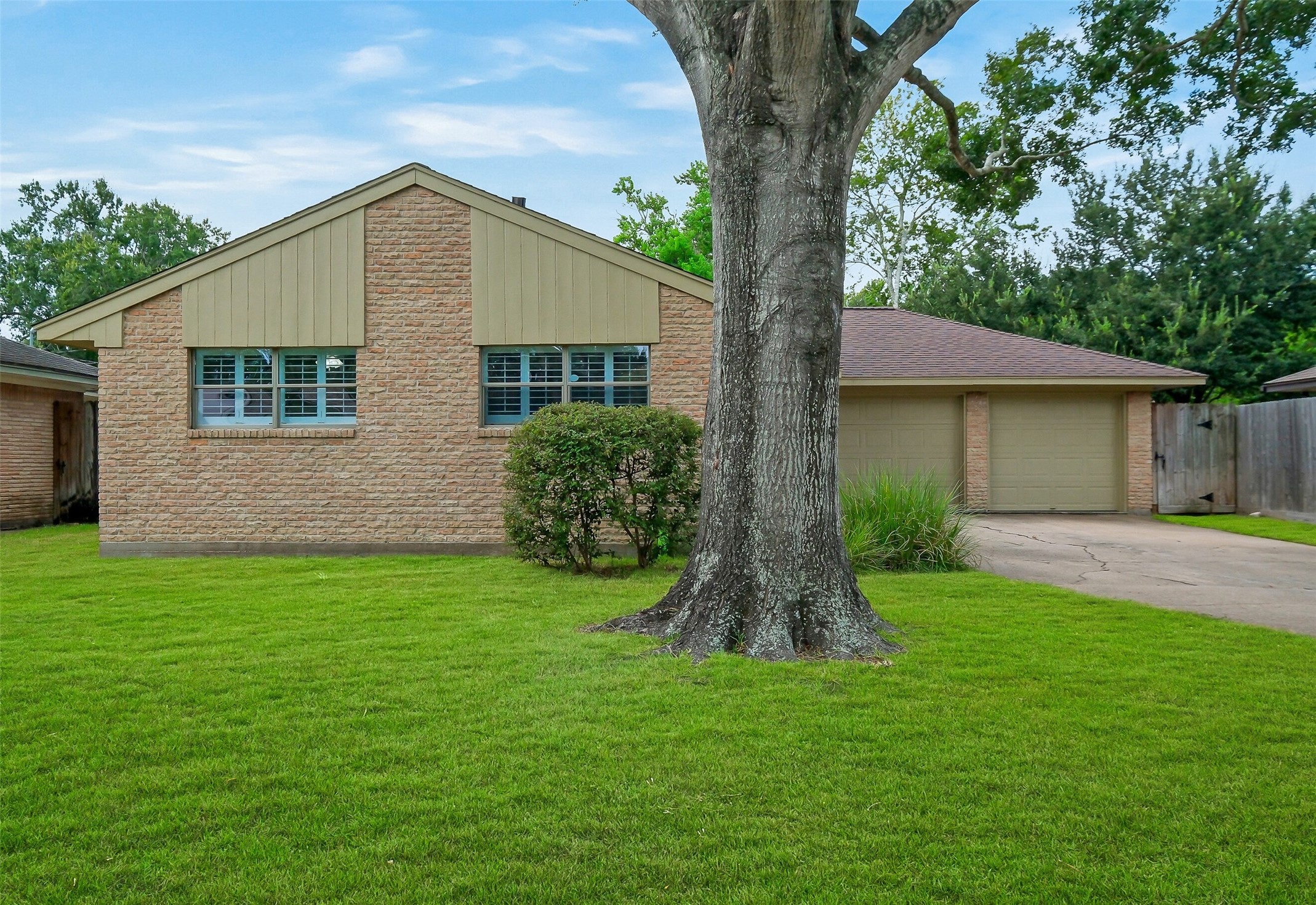 4415 Spellman Road Houston, TX 77035 - Photo 1 of 19 Welcome to 4415 Spellman Rd, an updated four-sided brick home tucked along a quiet street in the desirable Willowbend area. The inviting exterior is framed by a spacious front lawn, mature shade tree, and large front-facing and updated windows with plantation shutters, creating a classic and welcoming first look at the home. The home is updated with hardwood floors throughout (no carpet) recessed lighting, crown molding double paned, new supply lines, new underslab plumbing & great natural light.